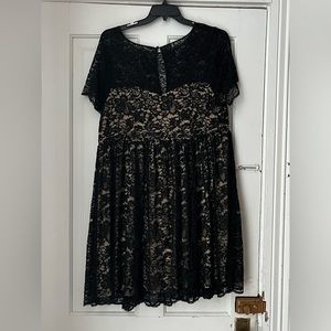 Black lace dress from Torrid. Size 3. Shirt sleeve hits right at the knee.